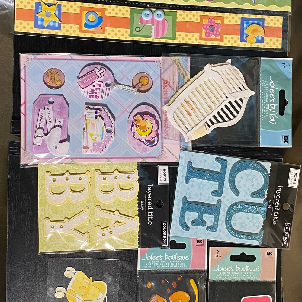 Lot of scrapbooking stickers for a new baby